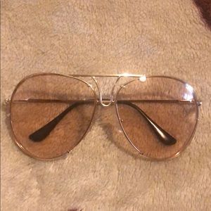 Gold framed sunglasses